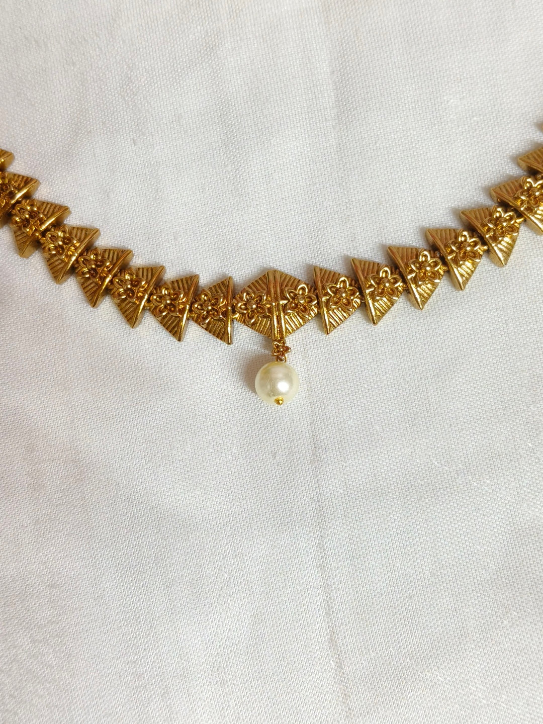 BRASS NECKLESS