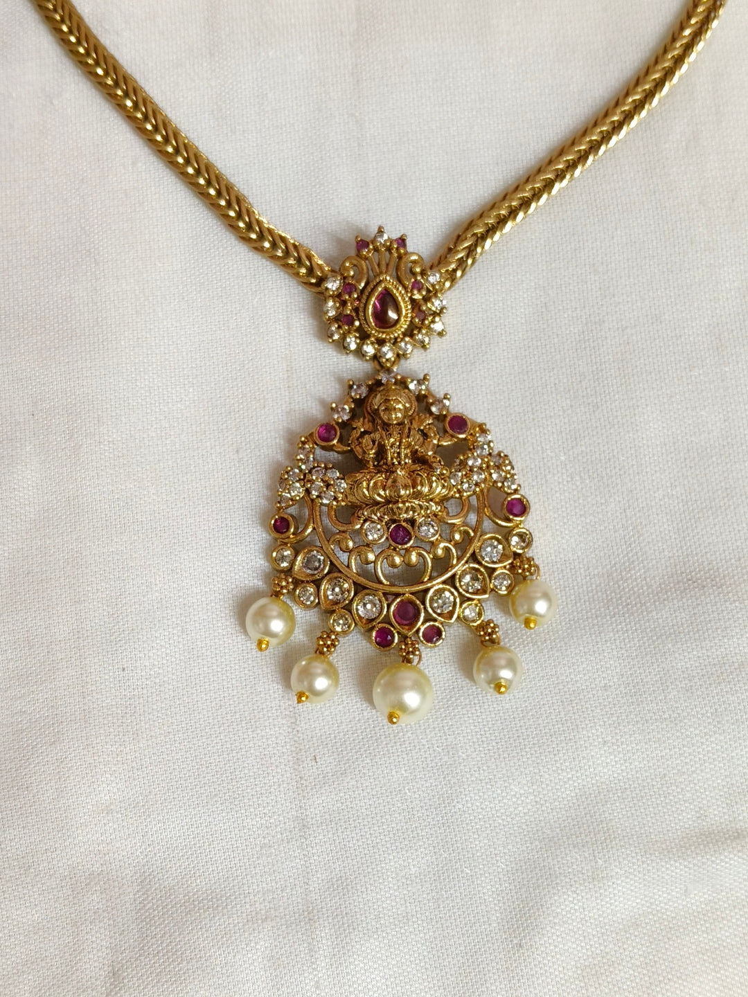 BRASS NECKLESS