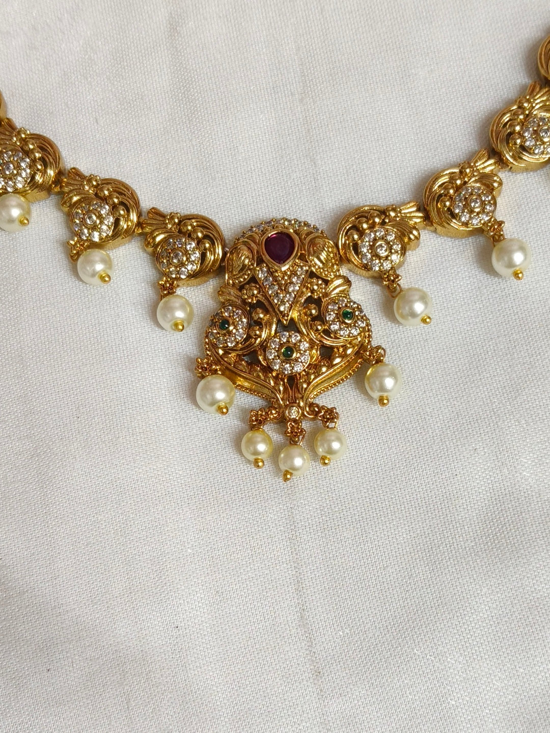 BRASS NECKLESS